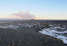 As tectonic plates pull apart, what drives the formation of rifts? A view of the graben, which emerged near the Holuhraun lava field in Iceland. The western boundary of the graben is seen in the foreground, in the center-right portion of the image, where the land begins to dip down. Credit: Stephan Kolzenburg