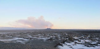 A view of the graben, which emerged near the Holuhraun lava field in Iceland. The western boundary of the graben is seen in the foreground, in the center-right portion of the image, where the land begins to dip down. Credit: Stephan Kolzenburg