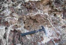 Geological carbon sequestration in mantle rocks prevents large earthquakes in parts of the San Andreas Fault Outcrop of carbonate-altered mantle rock in the San Andreas Fault area. A recent study shows that carbon sequestration in mantle rocks may prevent large earthquakes in parts of the San Andreas Fault. (Photo by Frieder Klein, © Woods Hole Oceanographic Institution)