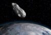 A massive asteroid slammed into the North Sea and triggered a 330-foot tsunami A depiction of an asteroid heading toward Earth, with the moon in the background. (Image credit: Juan Gartner via Getty Images)