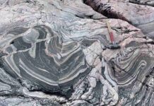 Rock steady: Study reveals new mechanism to explain how continents stabilized These ancient metamorphic rocks called gneisses, found on the Arctic Coast, represent the roots of the continents now exposed at the surface. The scientists said sedimentary rocks interlayered in these types of rocks would provide a heat engine for stabilizing the continents. Credit: Jesse Reimink. All Rights Reserved.