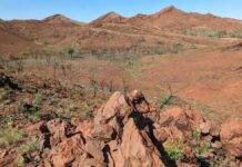 World’s oldest impact crater found, rewriting Earth’s ancient history Large conical shatter cones within the Pilbara Craton, Western Australia, provide visible proof of a meteorite impact 3.5 billion years ago. Credit: Chris Kirkland, Curtin University