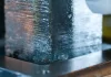 Scientists Find the First Ice Core From the European Alps That Dates Back to the Last Ice Age An ice sample on the melter during continuous ice core chemical analyses in the lab (credit: Sylvain Masclin).