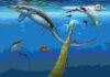 Oldest oceanic reptile ecosystem from the Age of Dinosaurs found on Arctic island Earliest oceanic tetrapod ecosystem from 249 million years ago. A pod of the small-bodied ichthyopterygian ('fish-lizard') Grippia longirostris hunting squid-like ammonoids (top left). The marine amphibian Aphaneramma captures the bony fish Bobastrania (foreground). The gigantic ichthyosaur Cymbospondylus lurks in the depths (bottom right). Fossil of these ancient marine reptiles and amphibians are today preserved on the Arctic island of Spitsbergen in the Svalbard archipelago. Credit: Robert Back