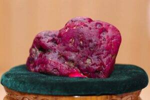 In this photo provided by Myanmar Military True News Information Team on Thursday, May 7, 2026, Myanmar’s newly discovered ruby is displayed at president office in Naypyitaw, Myanmar. (Myanmar Military True News Information Team via AP Photo)