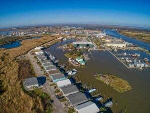 The mouth of the Mississippi River in south Louisiana. The delta of the Mississippi is sinking faster than local sea-level rise rates. Photo courtesy of Adobe Stock. 