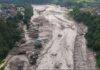 Nepal Flash Flood, August 2026: Ice-Rock Avalanche, River Damming, and Cascading Himalayan Hazards A drone view shows mud covering properties following a flash flood at Trishuli in Nuwakot district, Nepal, on Wednesday. Stringer/Reuters